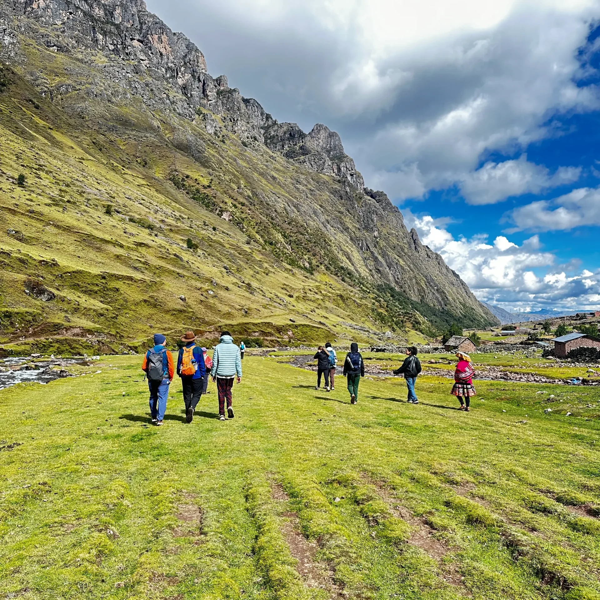 Backpackers exploring a trail in the Peruvian Andes